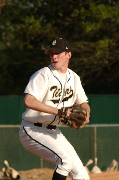 Dr. Jeremy Alland pitching in college